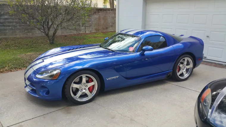 Blue Dodge Viper in the driveway