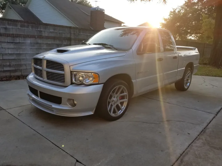 Silver performance pickup at sunset