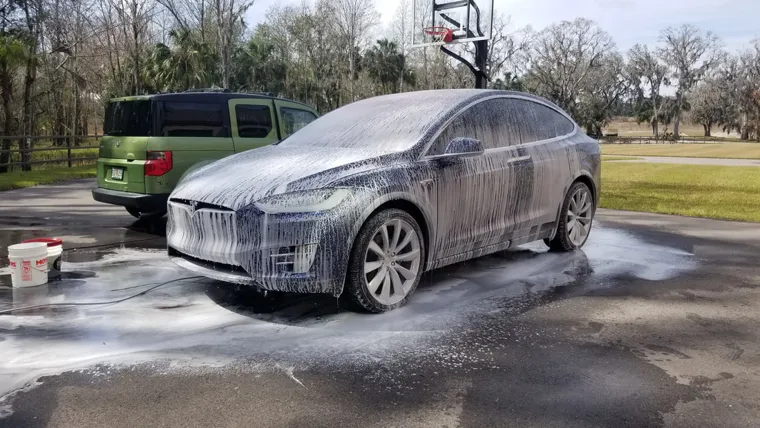 Foam wash on a silver car