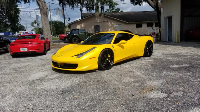 Yellow Ferrari outdoors