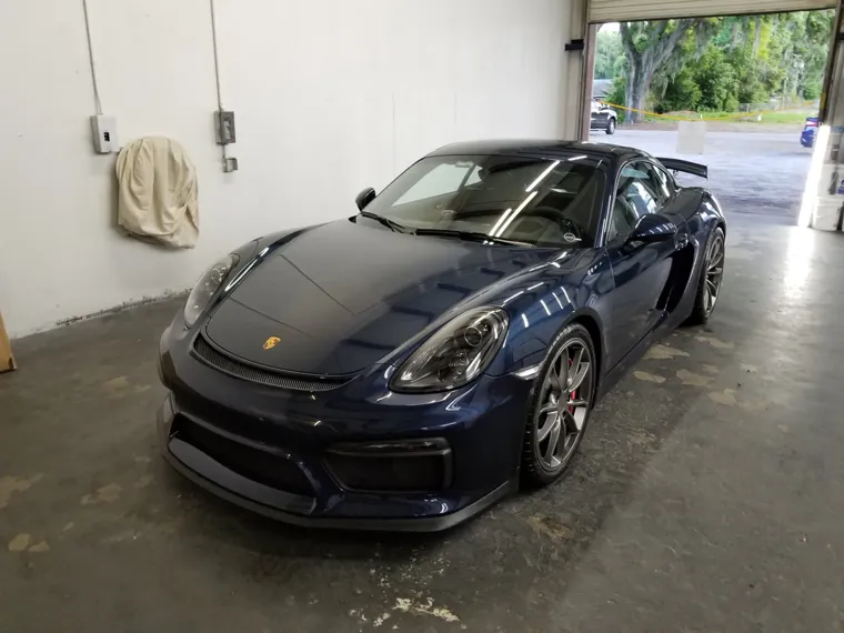 Dark blue Porsche in the studio