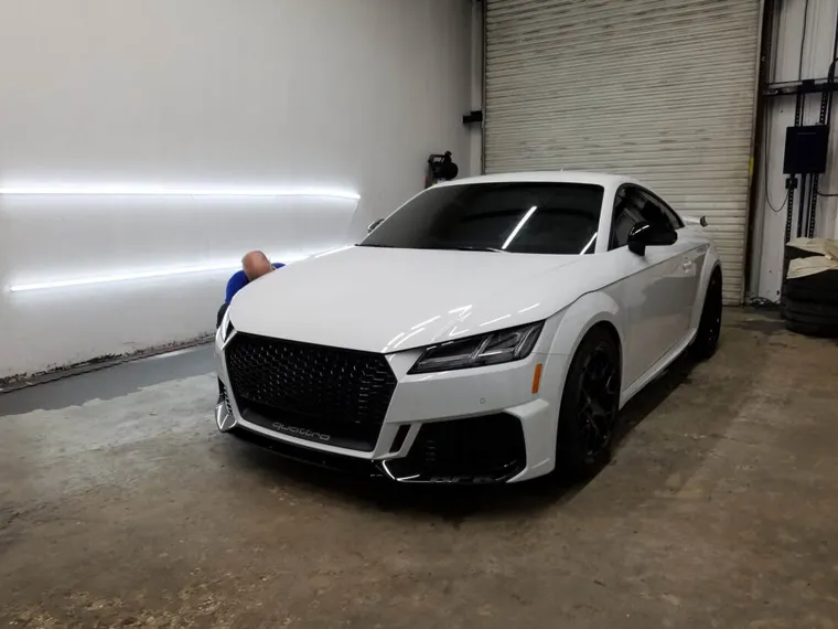 White Audi, front view