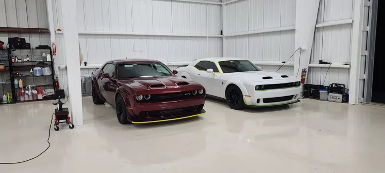 Performance cars inside the hangar