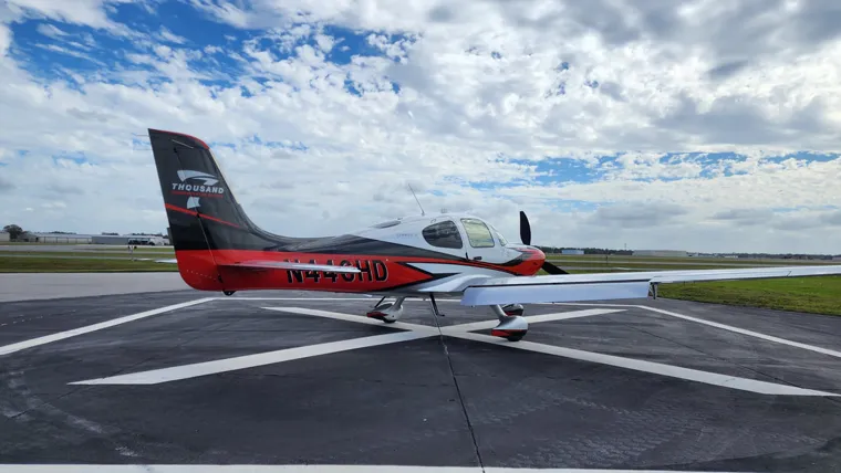 Red-and-white aircraft on the apron