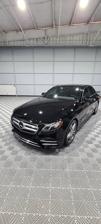 Black car under the studio lights