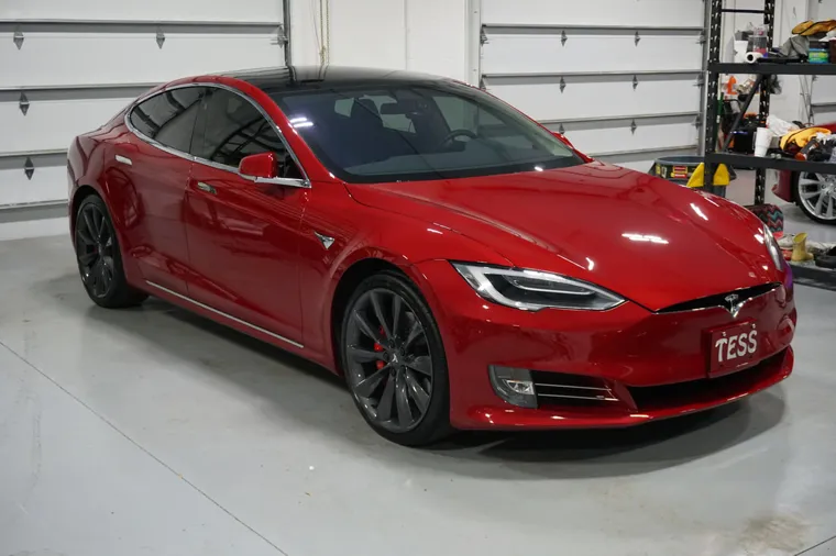 Red Tesla after detailing