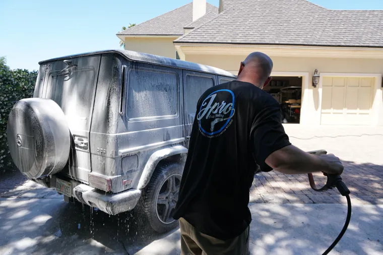 Washing a silver Mercedes-Benz G-Class