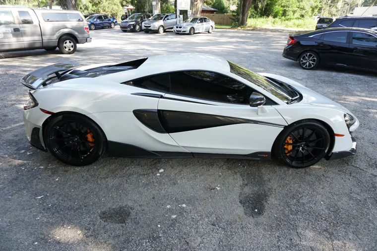 White McLaren, side profile